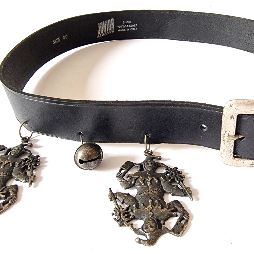 Leather belt with jester shaped charms attached