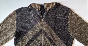 Shoulders of metallic lurex top