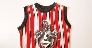 Close up of pinup illustration on striped vest