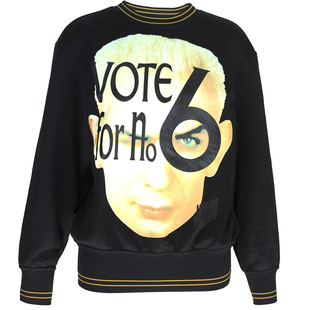 A black t-shirt with Jean Paul Gaultier's face on it.