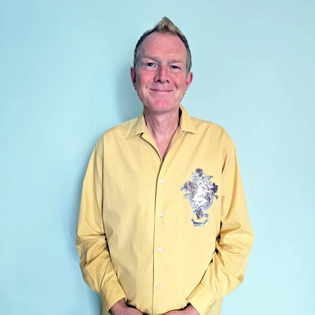 Person wearing yellow shirt.