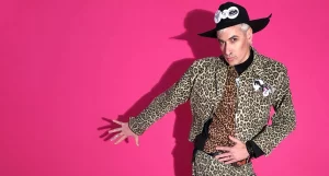 Riccardo Slavik. Stylist, Fashion Editor, and DJ wearing leopard print denim.