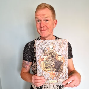 Me holding a point of sale poster