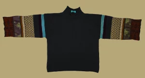 A multicoloured jumper on a gold background