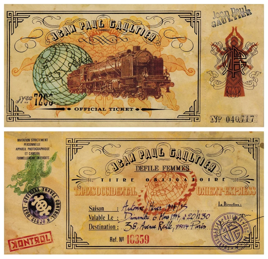 Back and front of show invite with etching of old locomotive and globe.