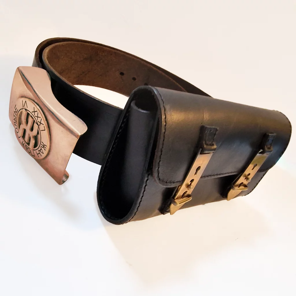 A belt with a buckle featuring Russian lettering