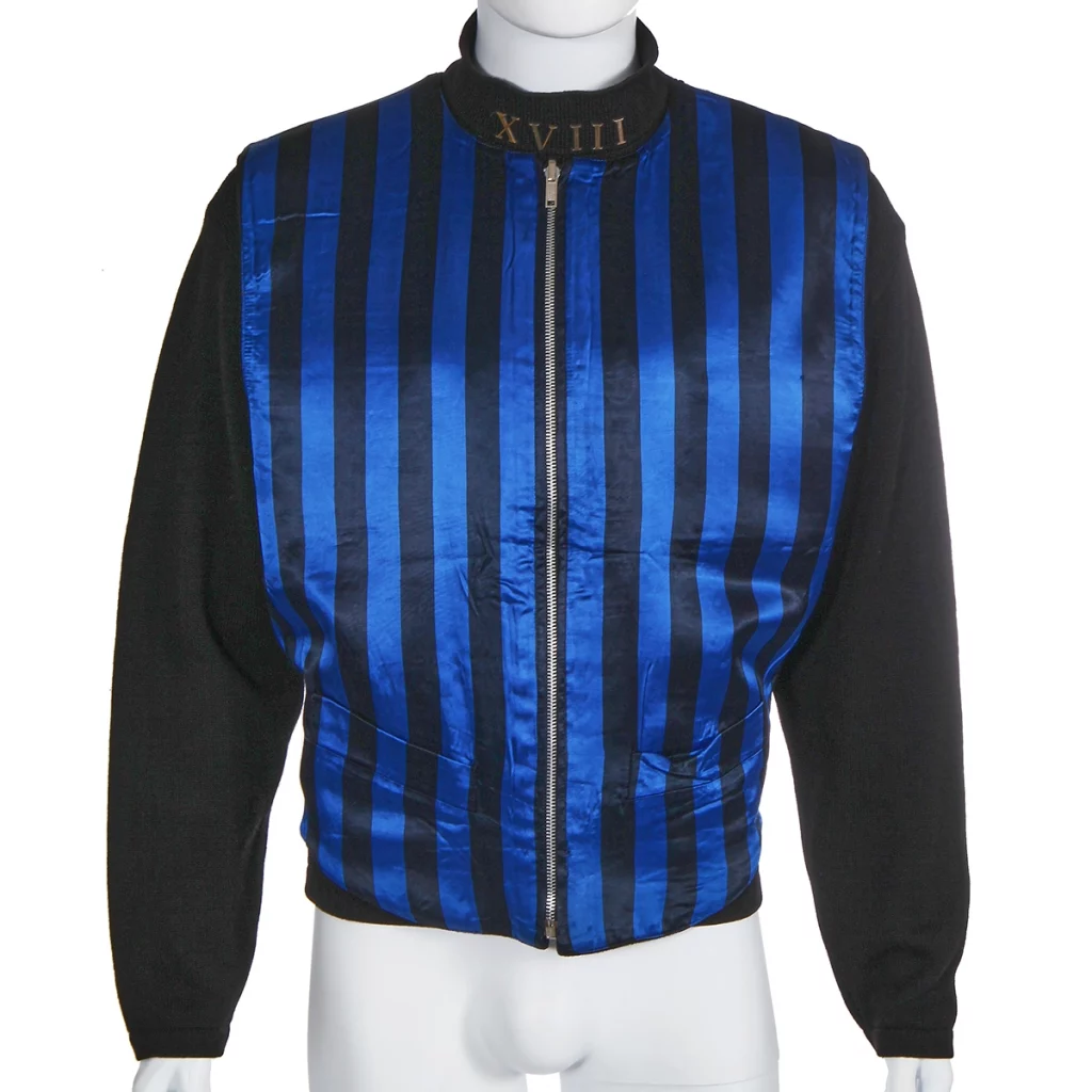 Black and blue vertically striped waistcoat on a mannequin.